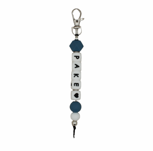 Gepersonaliseerde sleutelhanger met zwarte letters pake